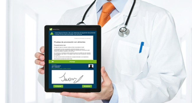 Signing on a tablet by a doctor